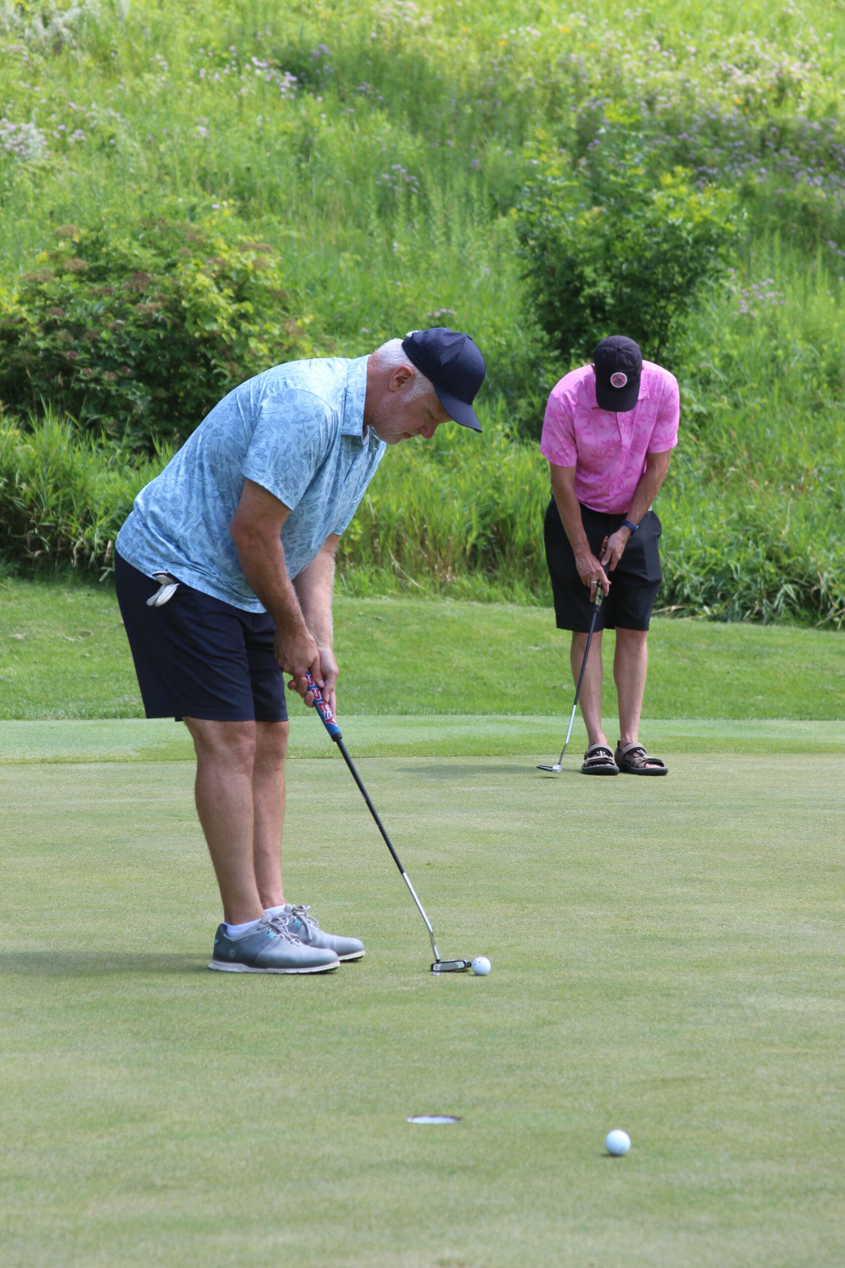 Media6 two men putting