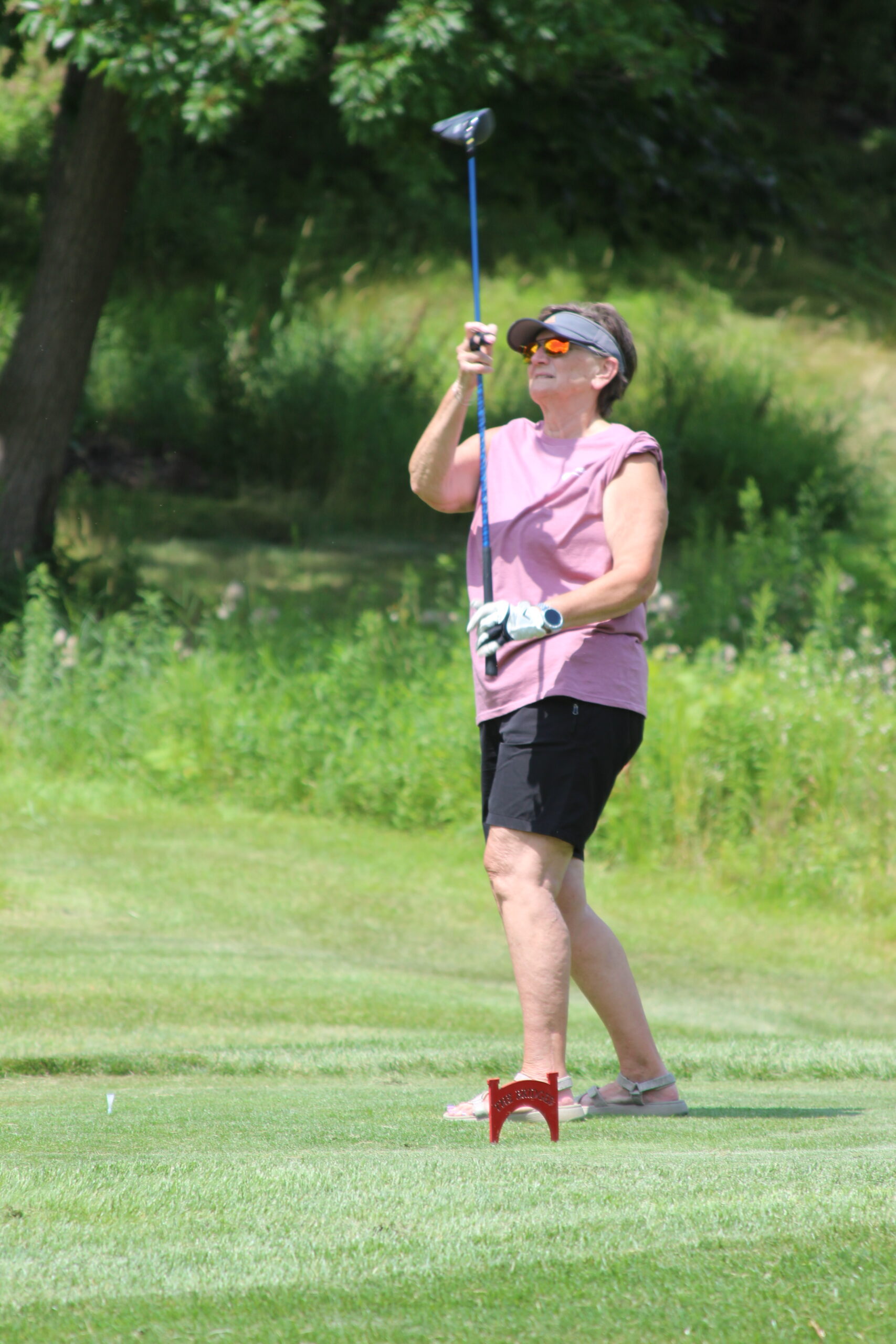 Media9 woman after a golf swing